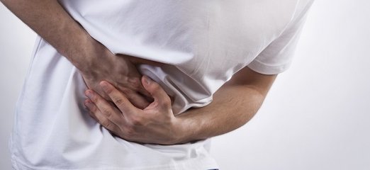 Sharp pain in right side of stomach