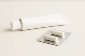 Vaginal yeast infection treatment on a clean tabletop, including antifungal cream and oral capsule in minimalist medical setting.