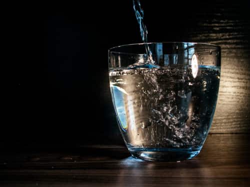 Drink more water. Experience fewer UTIs. Is it really that simple? The answer is yes and no.